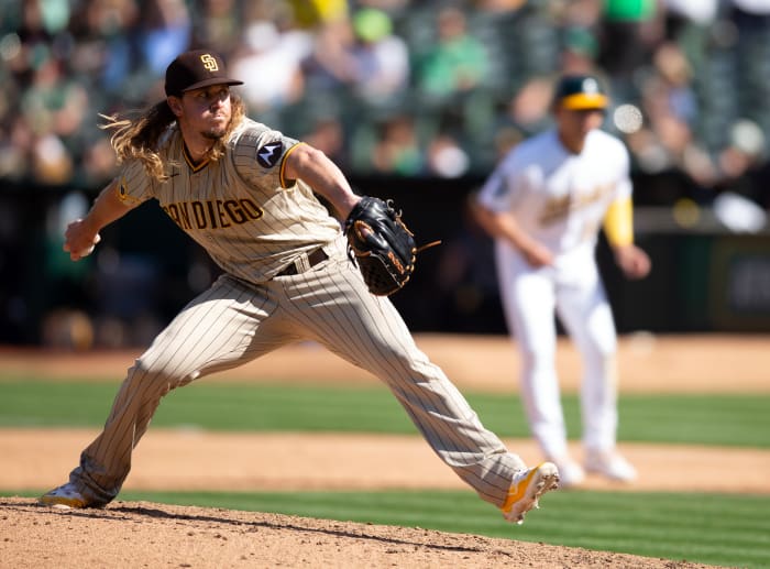 Sep 16, 2023; Oakland, California, USA; San Diego Padres pitcher Scott Barlow (58) pitches against the Oakland Athletics during the sixth inning at Oakland-Alameda County Coliseum. Mandatory Credit: D. Ross Cameron-USA TODAY Sports